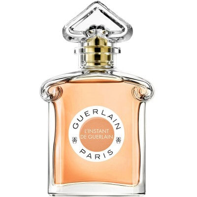 L'Instant de Eau de Parfum från Guerlain, en elegant doft med blommiga och träiga noter som förför och lämnar ett bestående intryck.